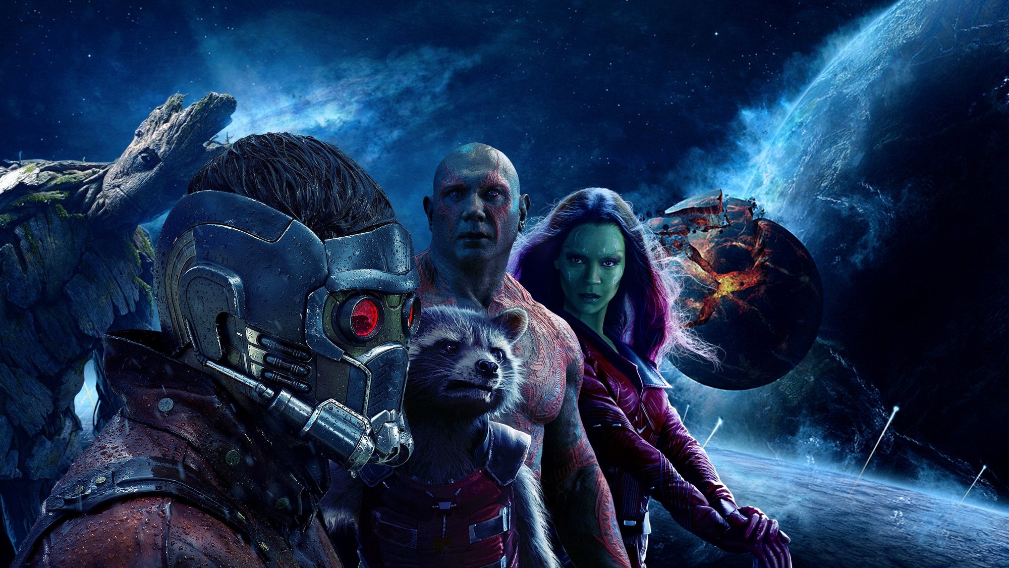 Dave Bautista caracterizado como Drax junto al resto de los Guardianes de la Galaxia frente a un planeta azul