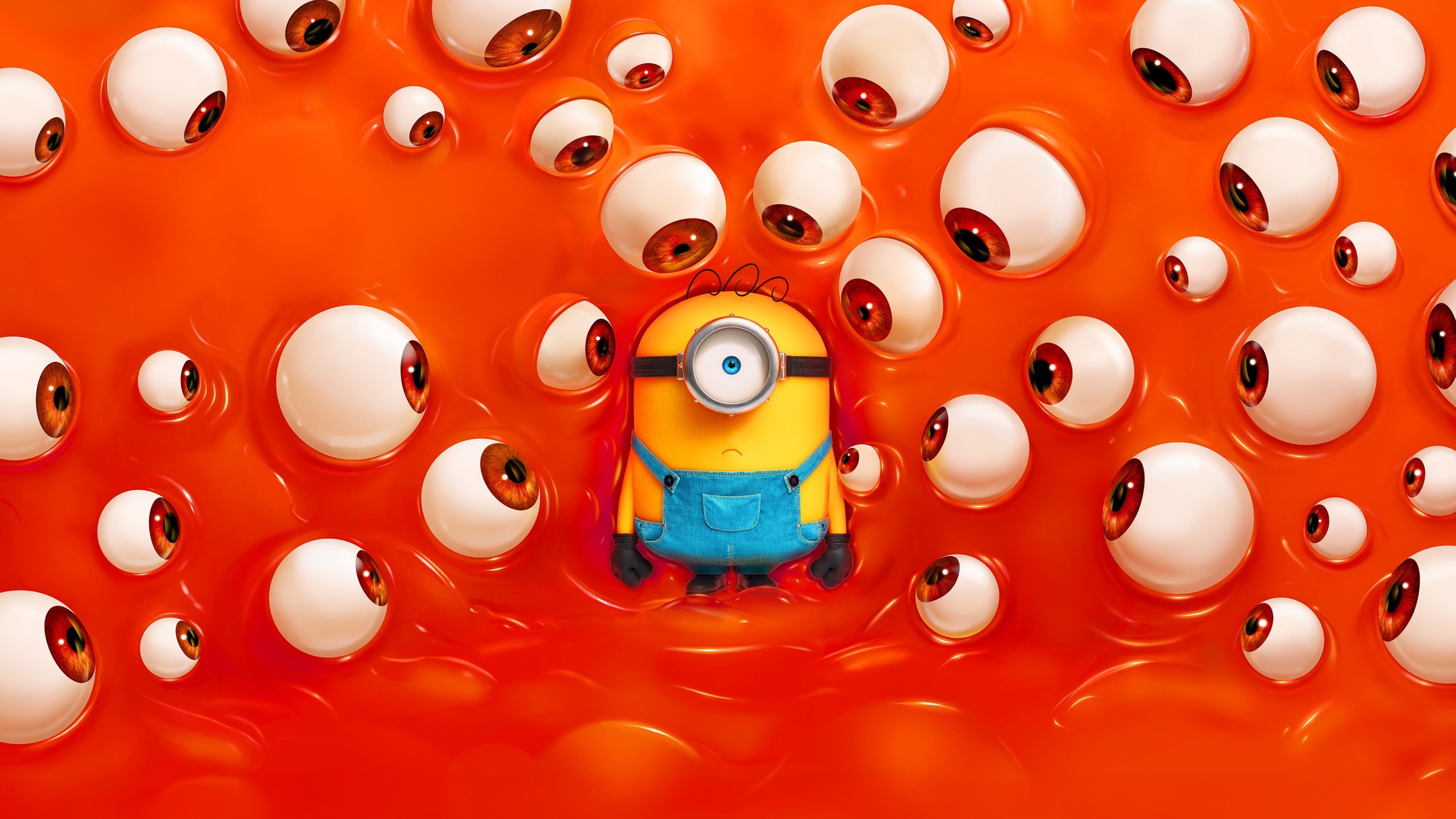 Un Minion de un solo ojo flota rodeado de decenas de globos oculares gigantes sobre un fondo naranja en Minions & Monsters
