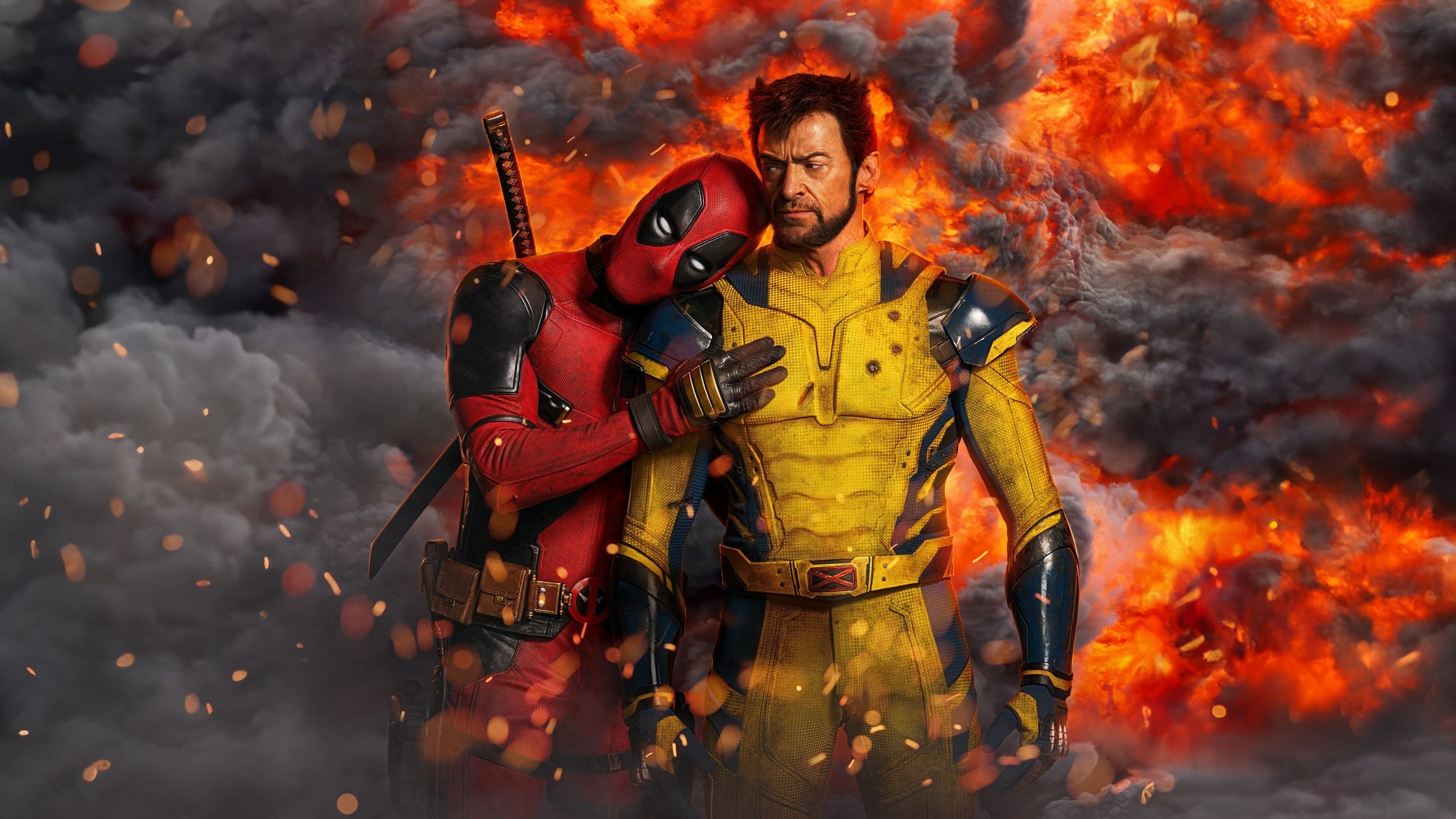Deadpool abraza por el hombro a Wolverine con gesto resignado mientras detrás estalla una enorme bola de fuego y humo