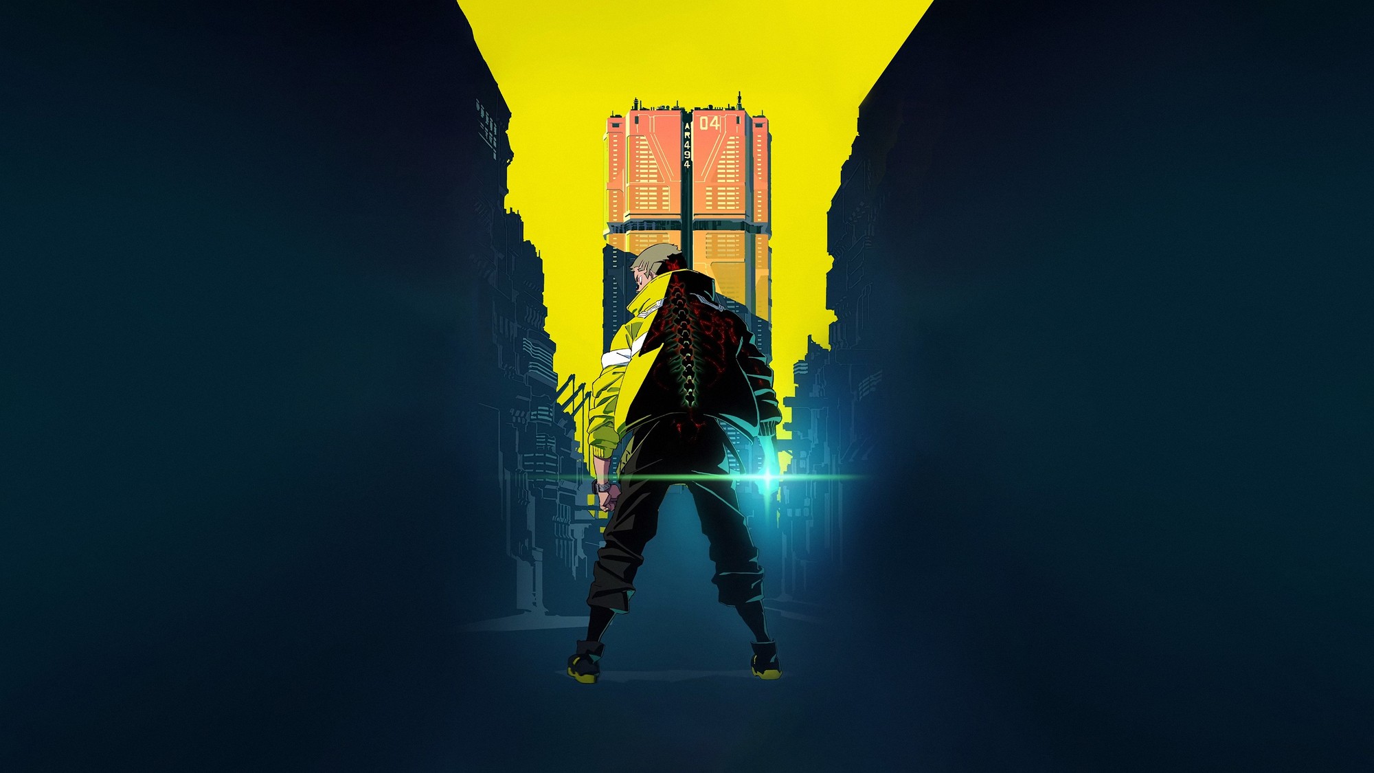 Un joven de espaldas con chaqueta amarilla en un callejón oscuro frente a una torre iluminada en Cyberpunk: Edgerunners